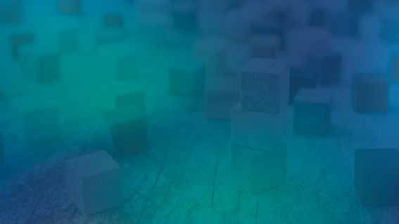 Bild auf dem gestapelte Würfel zu sehen sind, blau eingefärbt