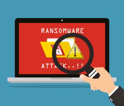 Grafik: Desktopansicht mit Ransomware-Meldung